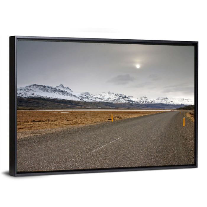 Icelandic Road to Snow-capped Mountains Wall Art as a framed canvas