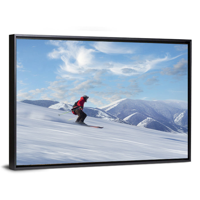 Skier on Snowy Mountain Slope Wall Art as a framed canvas