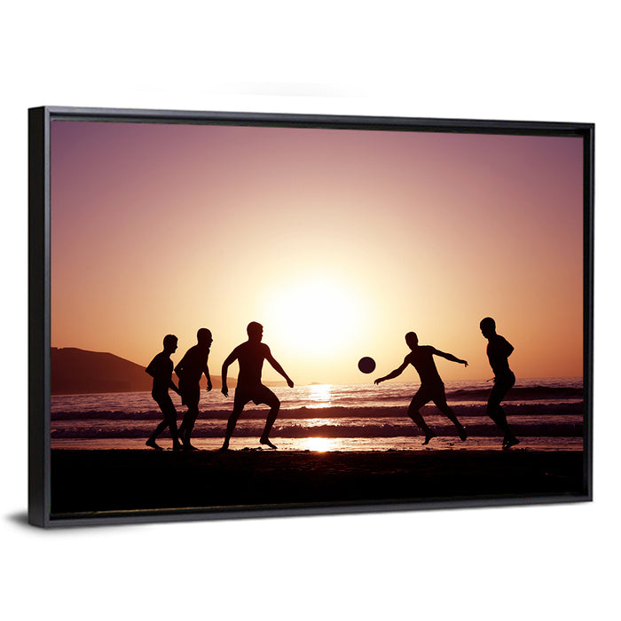 Beach Football at Sunset Wall Art as a framed canvas