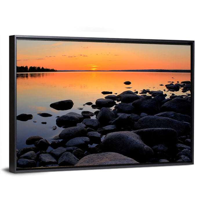 Rocky Lake Sunset Wall Art as a framed canvas