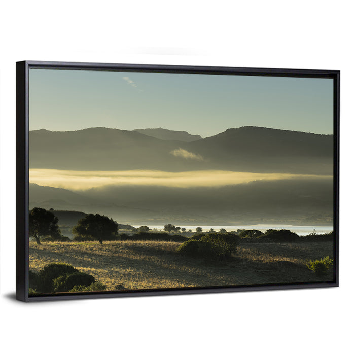 Lake Omodeo Morning Mist Wall Art as a framed canvas