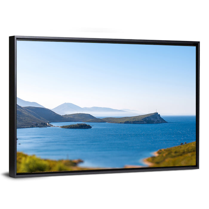 Coastal Cliffs and Lighthouse Bay Wall Art as a framed canvas