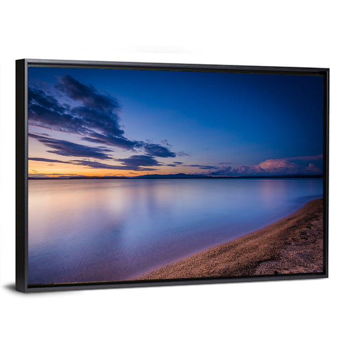 Lake Winnipesaukee Shoreline Sunset Wall Art as a framed canvas