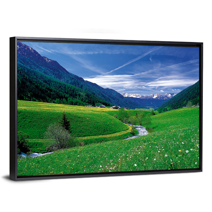 Snow-capped Peaks and Floral Meadow Wall Art as a framed canvas