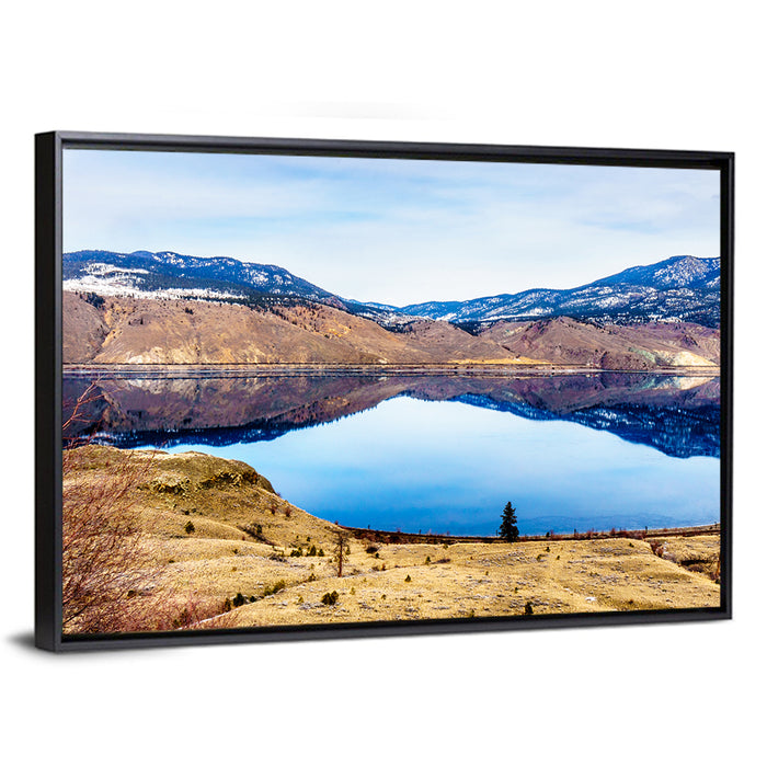 Kamloops Lake Sunset with Snow Capped Peaks Wall Art as a framed canvas