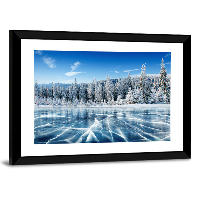Cracked Ice Lake with Snowy Pines Wall Art as a framed print