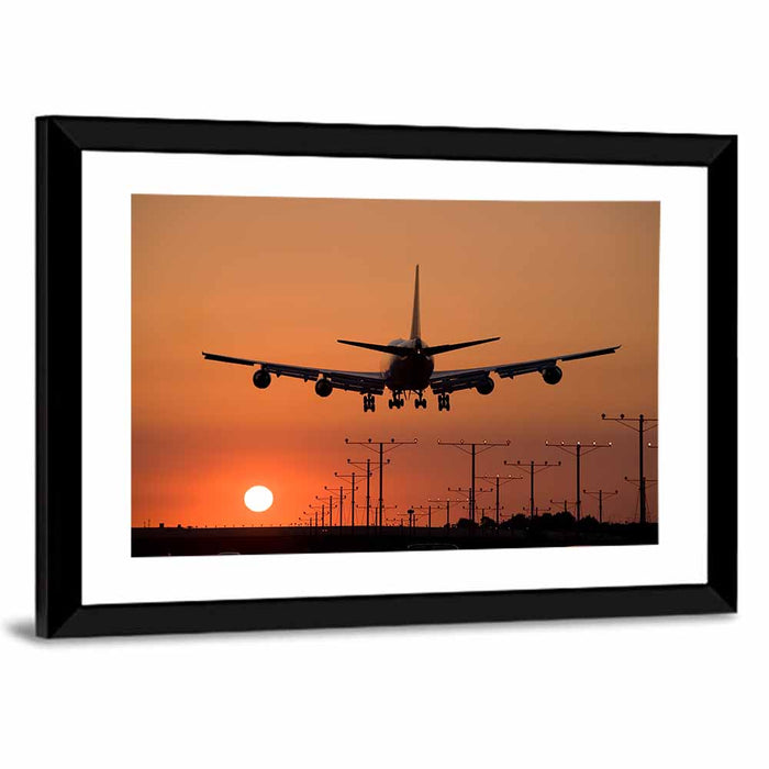 Airplane Landing at Sunset Wall Art as a framed print