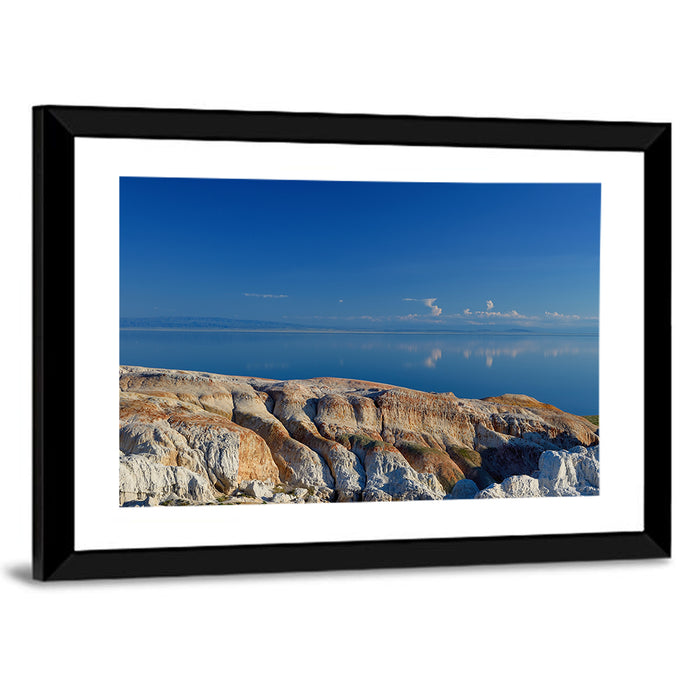 Shekelmes Tract Cliff Over Lake Wall Art as a framed print