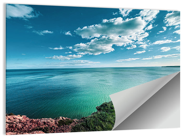 Coastal Cliffs Above a Turquoise Sea Wall Art as a poster print