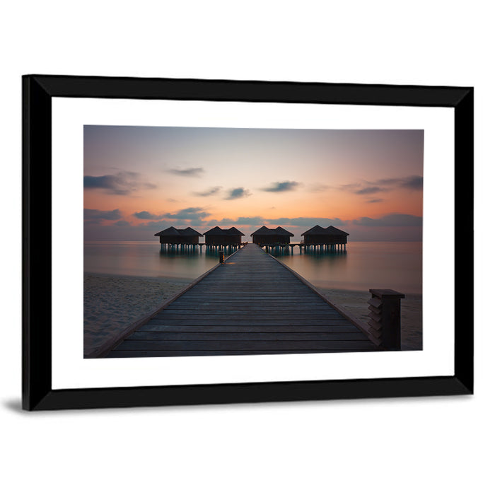 Overwater Bungalows at Sunset Wall Art as a framed print