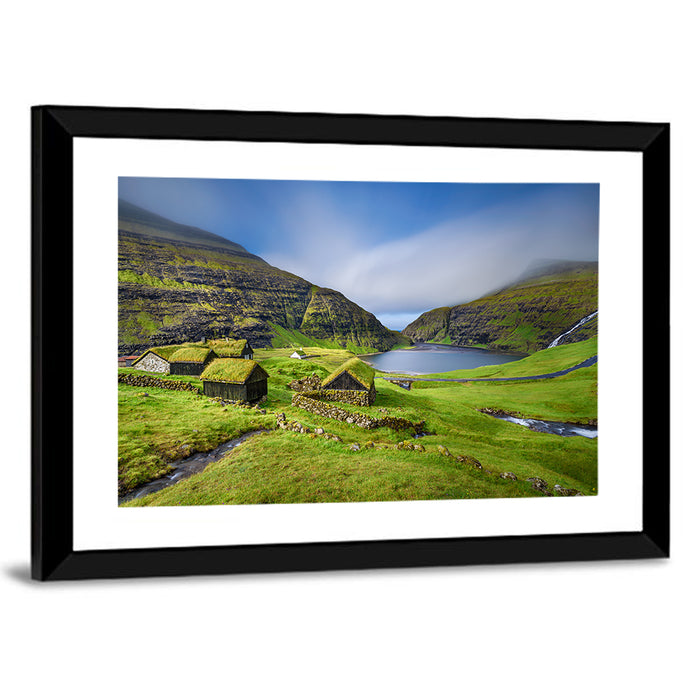 Saksun Turf Roof Cabins Wall Art as a framed print
