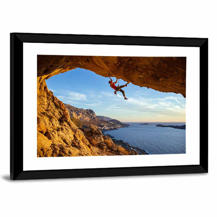 Climber on Overhanging Coastal Rock Wall Art as a framed print