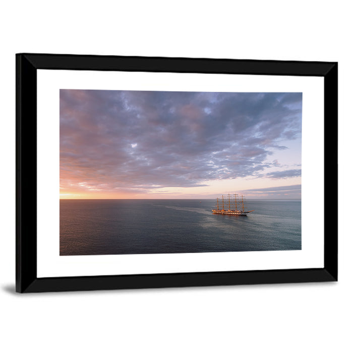 Sunlit Tall Ship at Sea Wall Art as a framed print