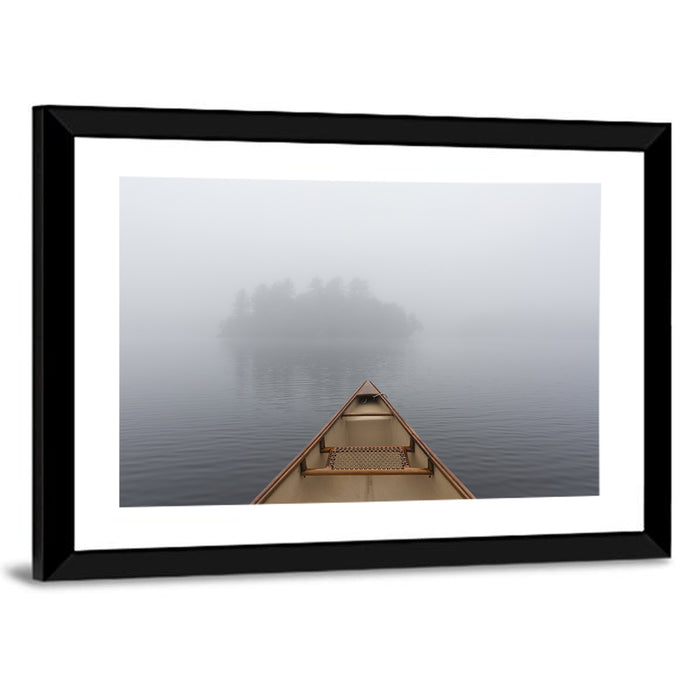 Canoe on Misty Ontario Lake Wall Art as a framed print
