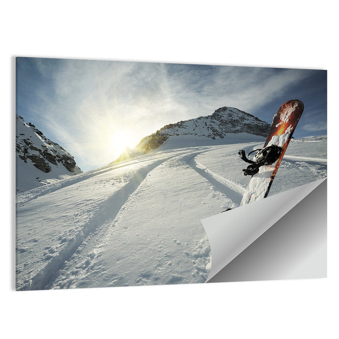 Snowboard on Snow-covered Mountain Slope Wall Art as a poster print