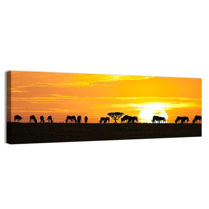Wildebeest Silhouettes at Sunset Wall Art as a canvas print