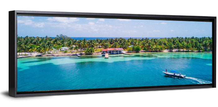 Belize Reef Island Pier Wall Art as a framed canvas
