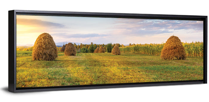 Haystacks at Sunset Fieldscape Wall Art as a framed canvas