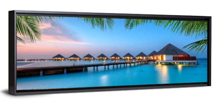 Overwater Bungalows at Twilight Wall Art as a framed canvas