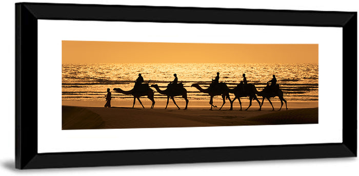 Camel Caravan Silhouette on Wet Sand Wall Art as a framed print