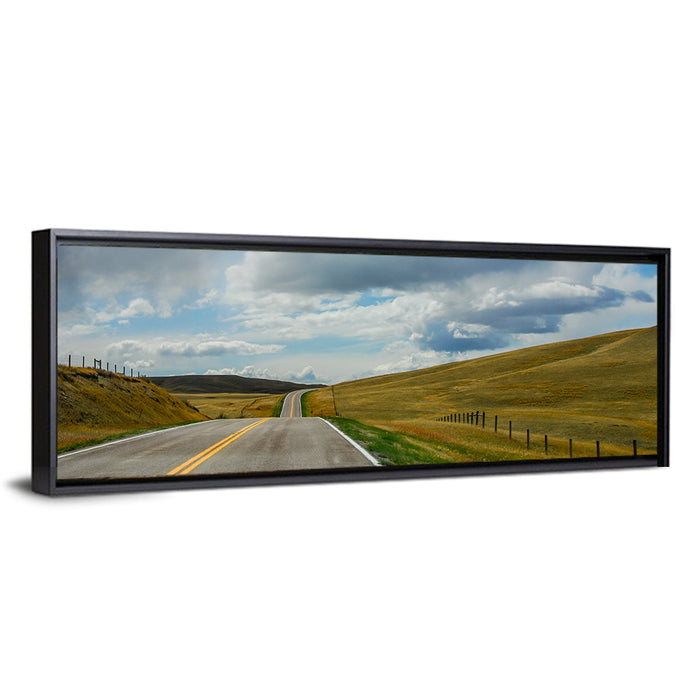 Montana Road Through Golden Hills Wall Art as a framed canvas