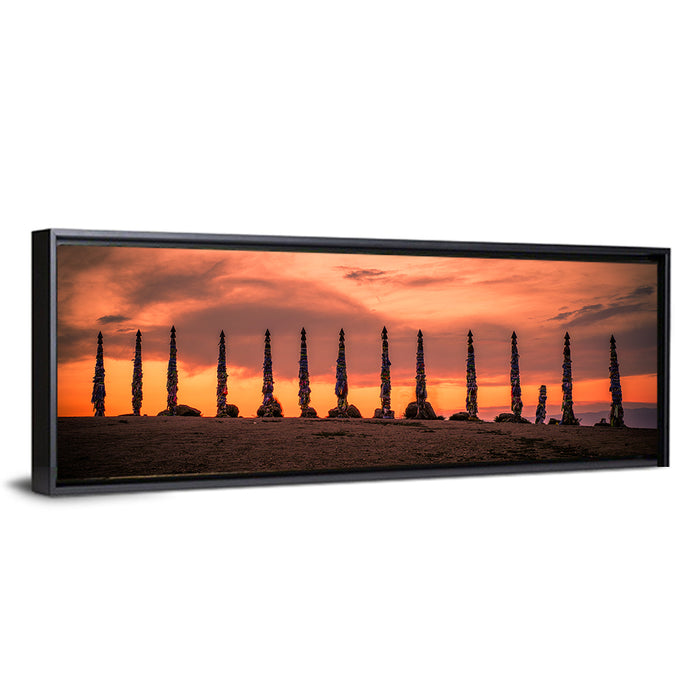 Shaman Pillars at Dusk Wall Art as a framed canvas