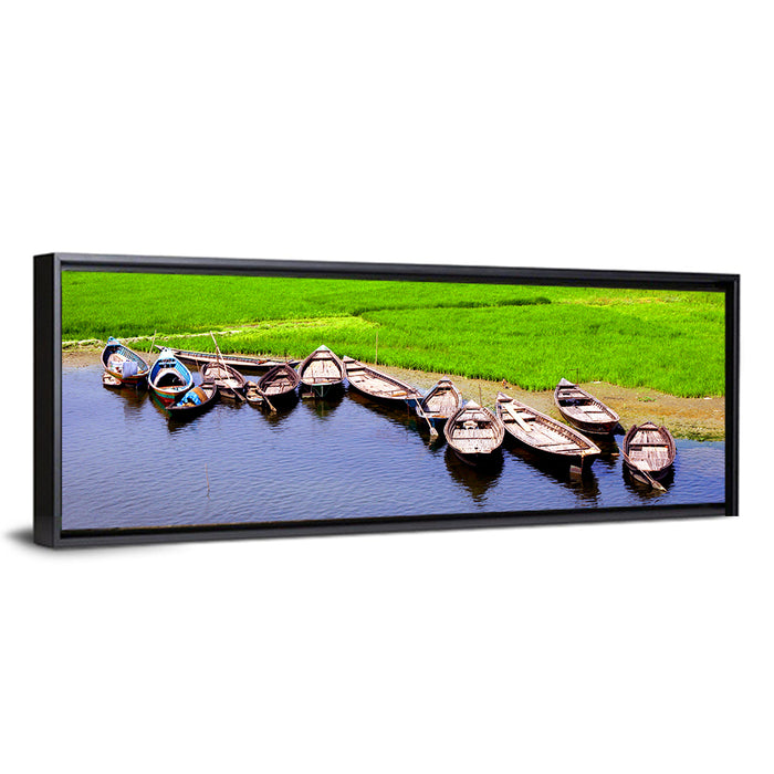 Boats at the Shoreline Wall Art as a framed canvas