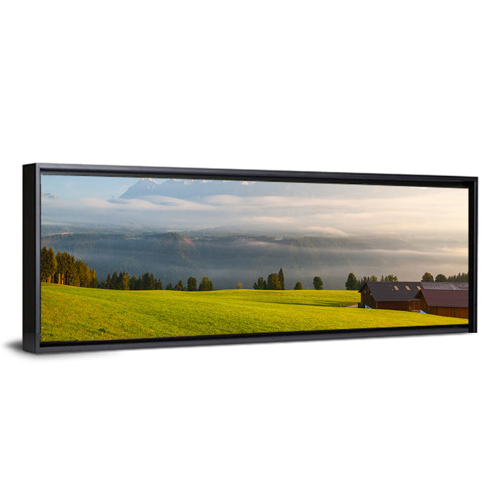Sunlit Mountain Clouds Wall Art as a framed canvas