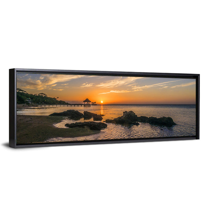Roatan Pier Sunset Wall Art as a framed canvas