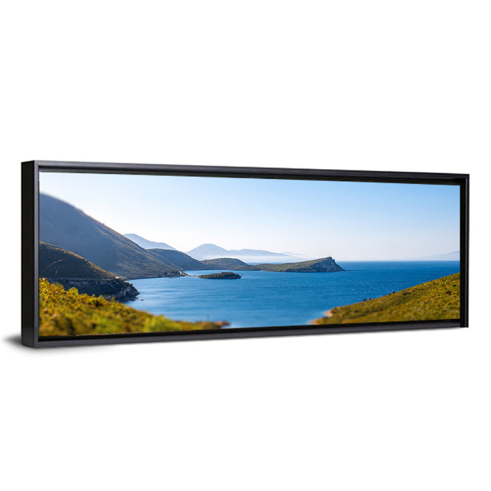 Coastal Cliffs and Lighthouse Bay Wall Art as a framed canvas