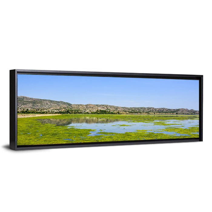Uchali Lake Algae Reflection Wall Art as a framed canvas