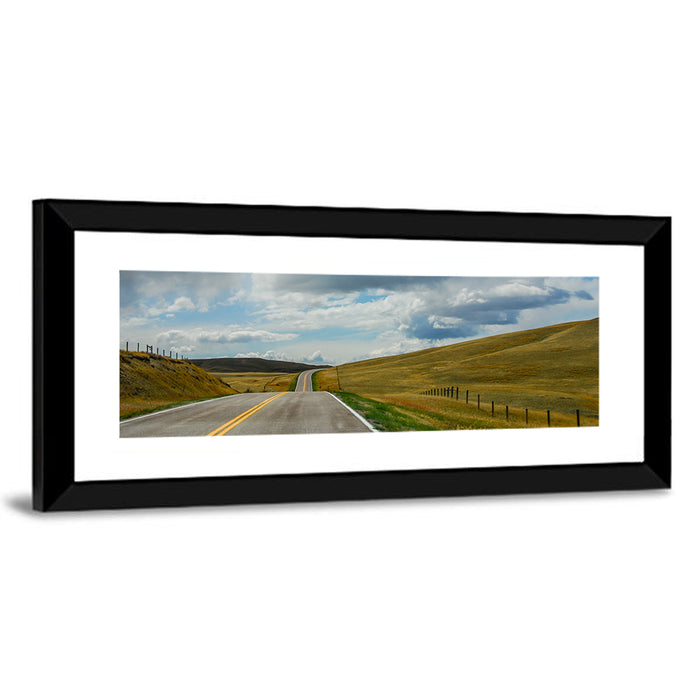 Montana Road Through Golden Hills Wall Art as a framed print