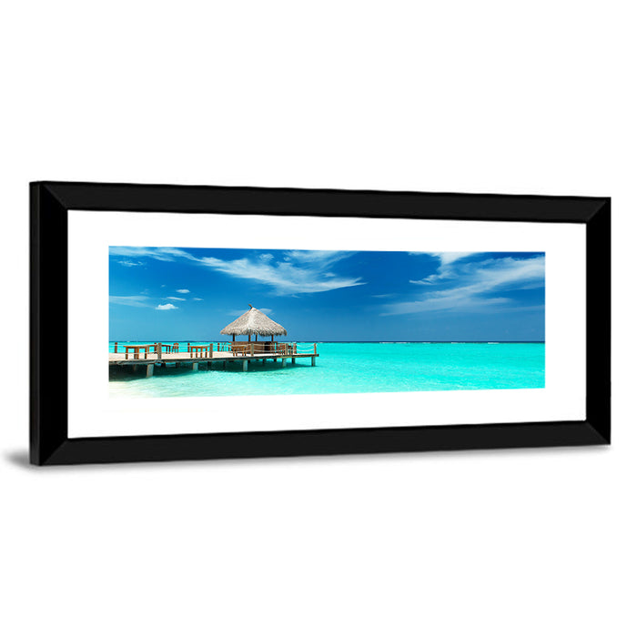 Thatched Beach Bar Pier Wall Art as a framed print