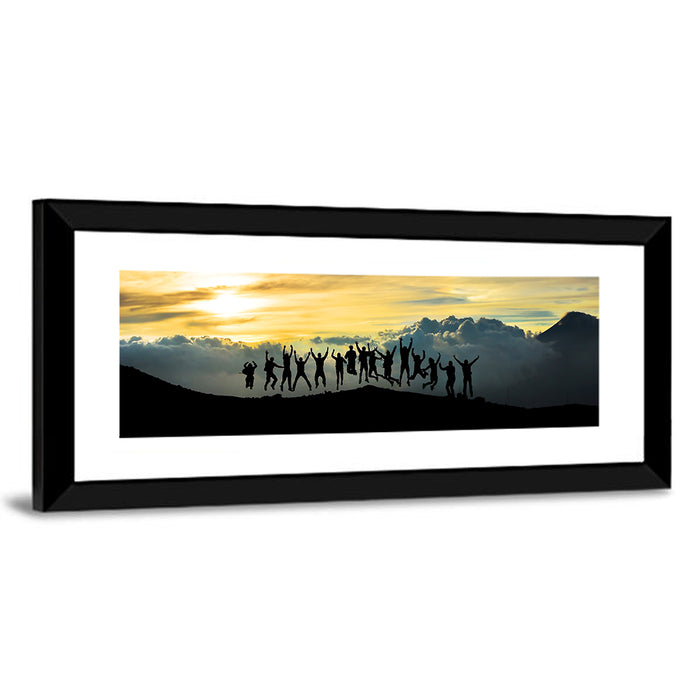 Golden Team Silhouettes at Sunset Wall Art as a framed print