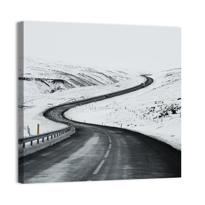 Winding Snow Road with Yellow Markers Wall Art as a canvas print