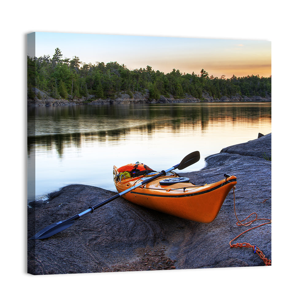 Kayak On River Bank Wall Art