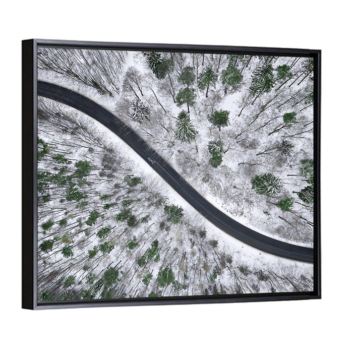 Snowy Forest Road Wall Art as a framed canvas