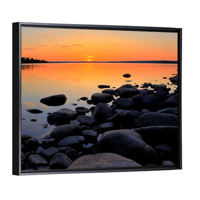 Rocky Lake Sunset Wall Art as a framed canvas
