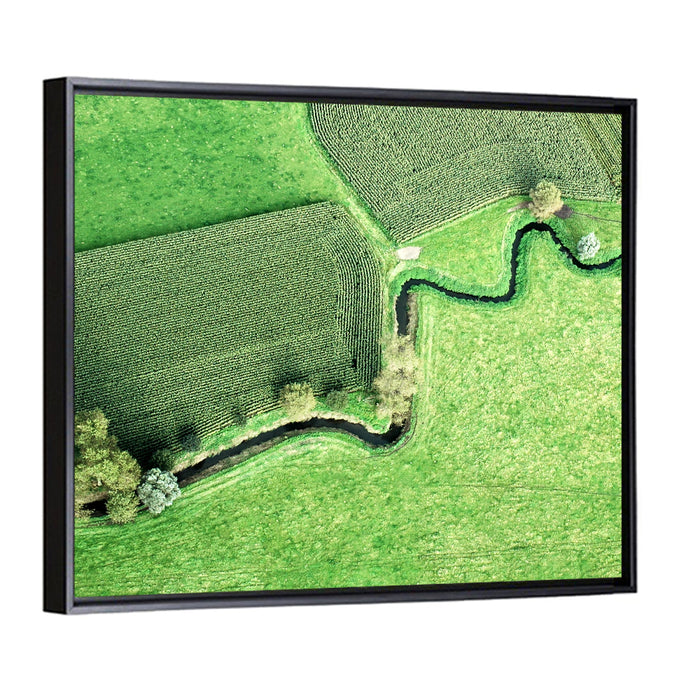 Meandering Stream Over Farmland Wall Art as a framed canvas