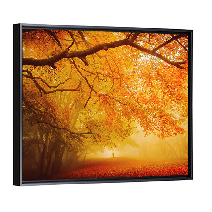 Autumn Forest Path with Lone Figure Wall Art as a framed canvas