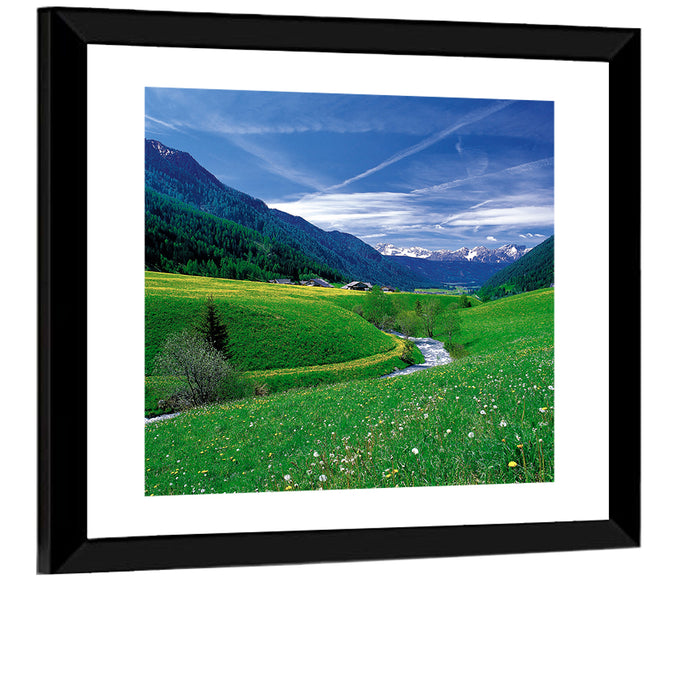 Snow-capped Peaks and Floral Meadow Wall Art as a framed print