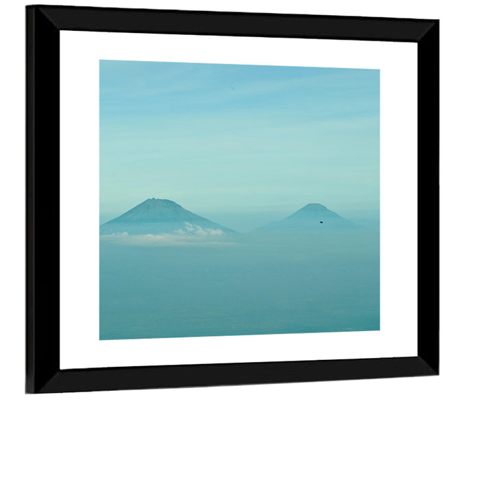 Sumbing and Sindoro Volcanoes Wall Art as a framed print