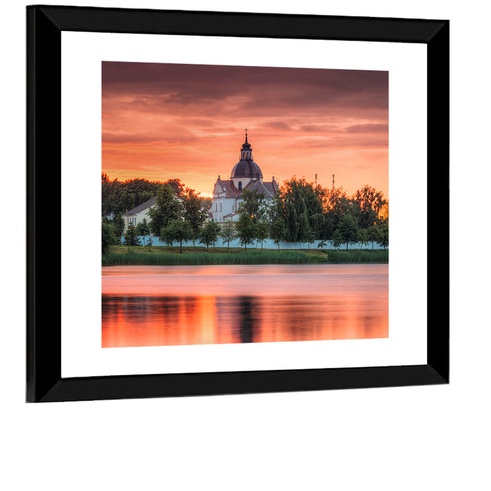 Corpus Christi Church Sunset Reflection Wall Art as a framed print
