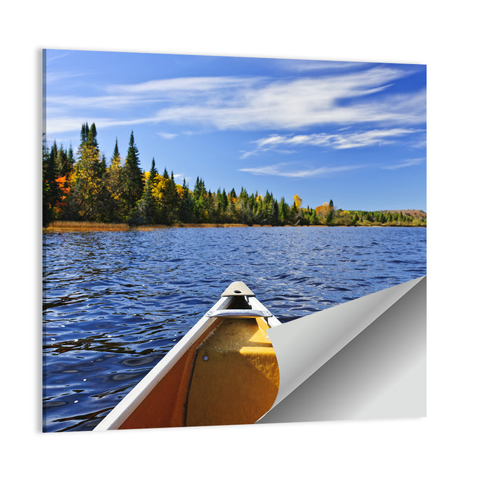 Yellow Canoe Bow on Blue Lake Wall Art as a poster print