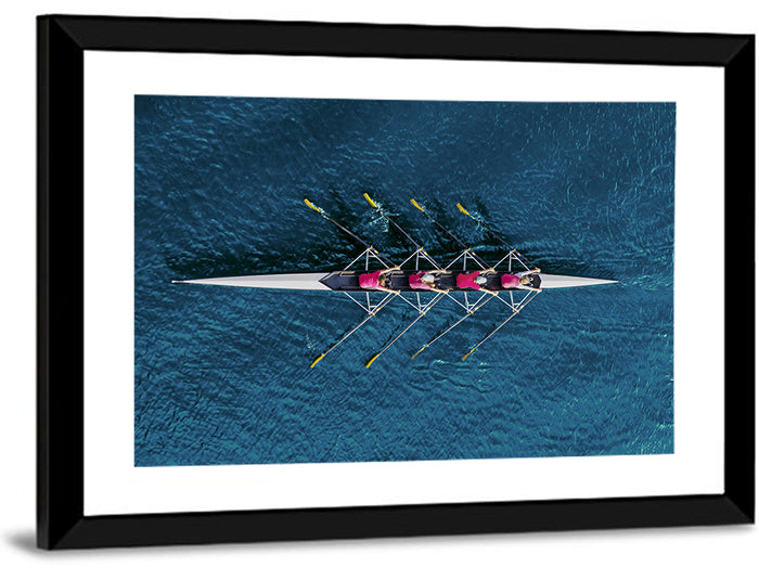Four Rowers in Pink Shirts Wall Art as a framed print