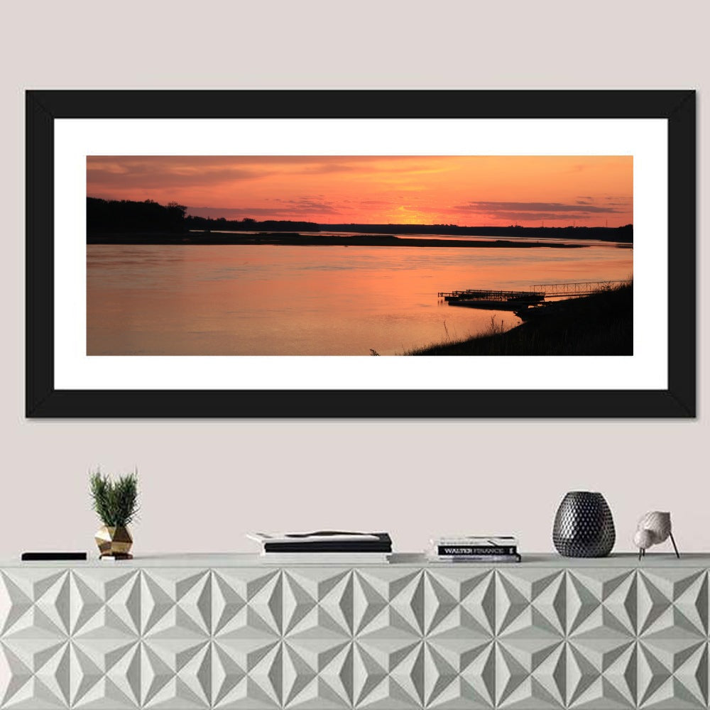 Missouri River Sunset at Dusk Wall Art in a room, panoramic