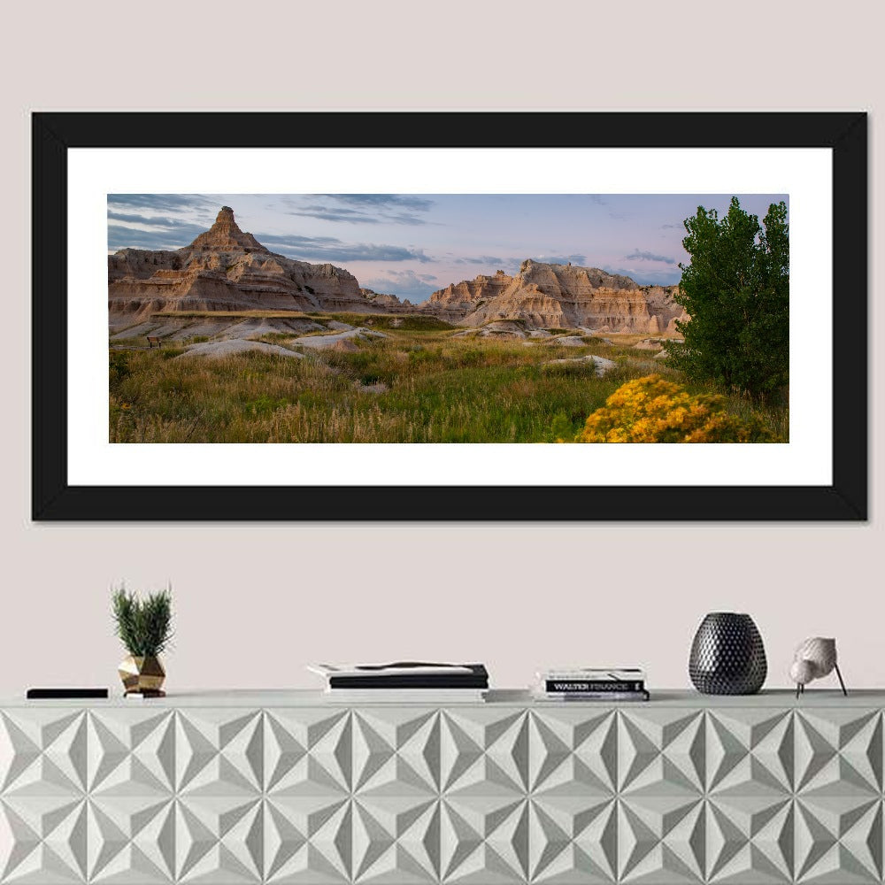 Badlands Golden Hour Meadow Wall Art in a room, panoramic