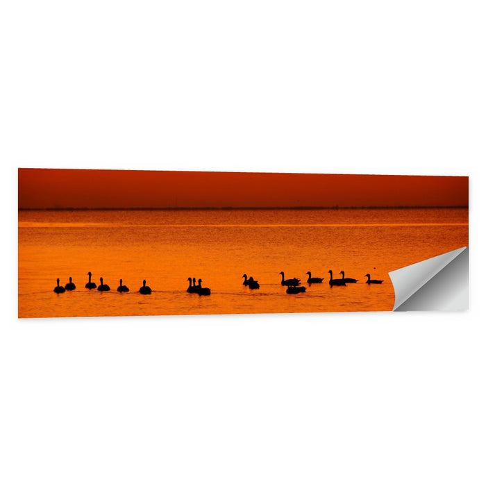 Geese Silhouettes at Orange Sunset Wall Art as a poster print