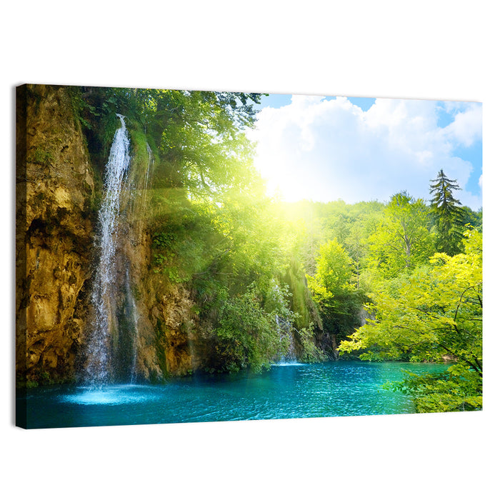 Forest Waterfall at Sunlit Lake Wall Art as a canvas print