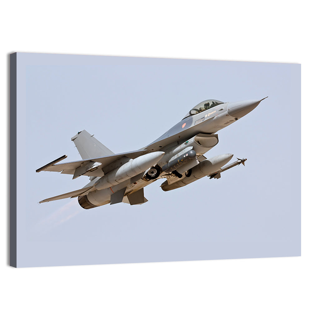 F-16 Fighter Jet Banking Over Sky Wall Art